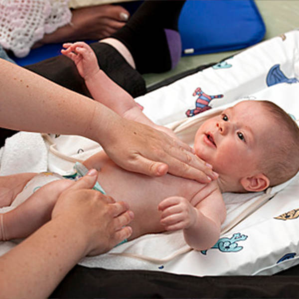 Photo of a baby having their nappy changed 