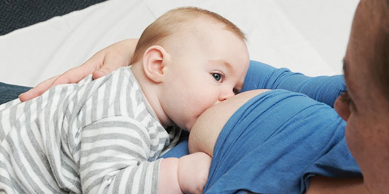 Photo of a baby breastfeeding 