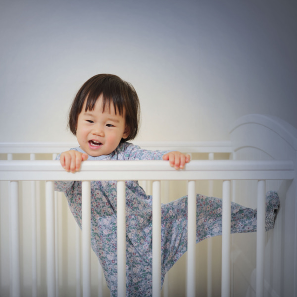 Toddler escaping cot